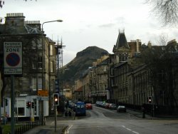 Edinburgh street with Arthur's Seat in background